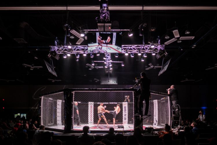 MMA fighters in a cage